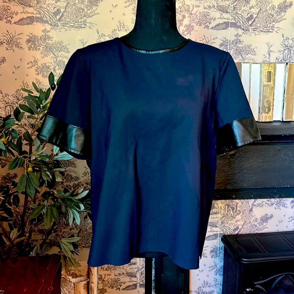 Faux leather cuff sleeve, and neckline tunic top